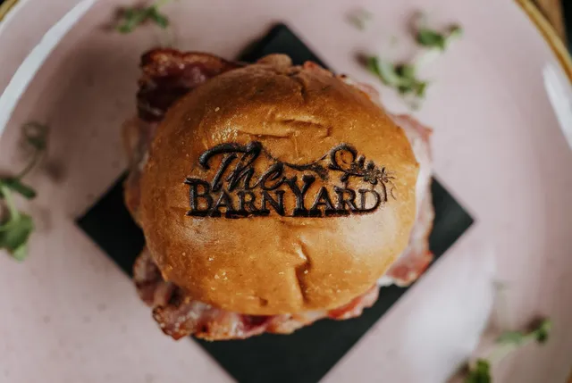A burger in a branded BarnYard bun