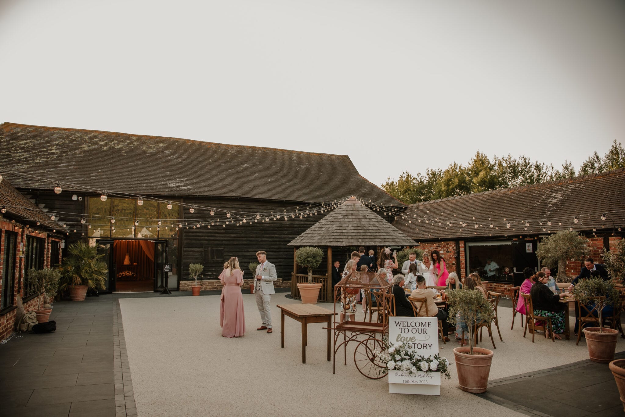 An evening reception under string lights